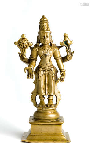 A BRASS FIGURE OF VISHNU, DECCAN, SOUTHERN INDIA, CIRCA 18TH CENTURY