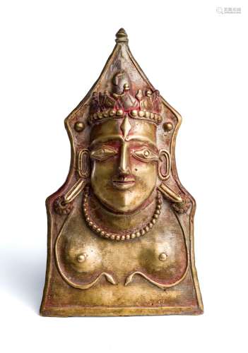 A BRASS SIVA MASK (MOHRA), HIMACHAL PRADESH, 15TH CENTURY OR LATER