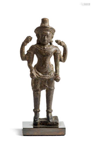 A KHMER BRONZE FIGURE OF VISHNU, ANGKOR WAT, CAMBODIA, 12TH CENTURY