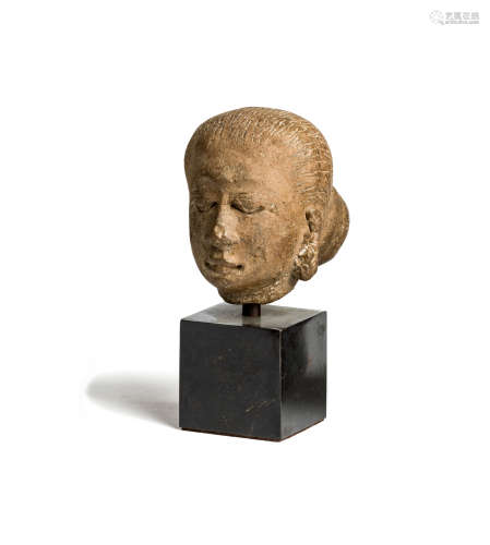 A MAJAPAHIT TERRACOTTA HEAD OF AN OLD WOMAN, JAVA, CIRCA 14TH CENTURY