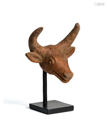 A MAJAPAHIT FRAGMENTARY TERRACOTTA HEAD OF A BUFFALO, JAVA, CIRCA 14TH CENTURY