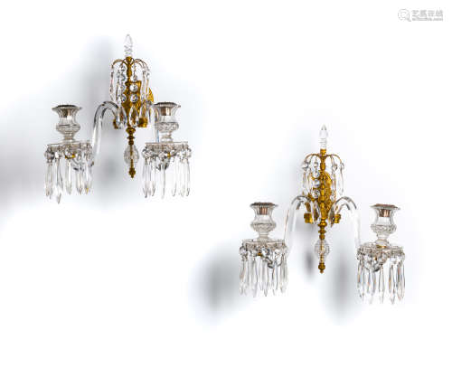 A PAIR OF GILT-METAL AND CUT-GLASS TWO-LIGHT WALL SCONCES