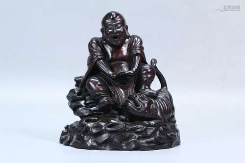 A Chinese Rosewood Arhat Statue