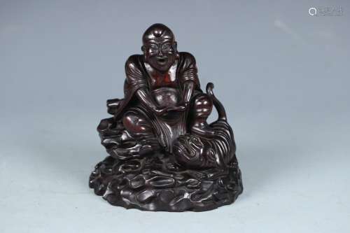 A Chinese Rosewood Arhat Statue