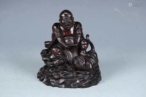 A Chinese Rosewood Arhat Statue