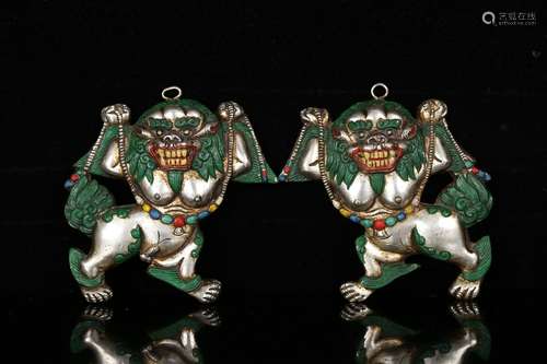 Pair Of Chinese Silver Lion Ornaments