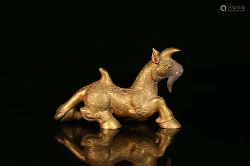 A Chinese Gilt Bronze Beast Ornament