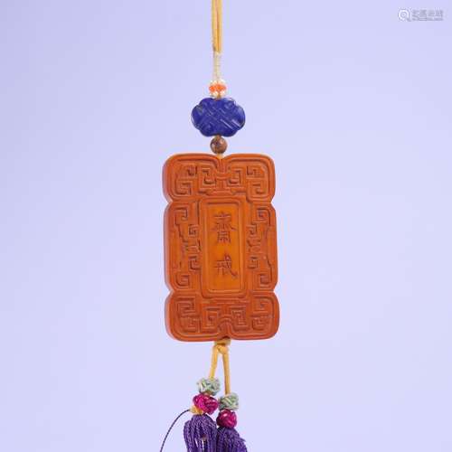 A Chinese Wood Pendant