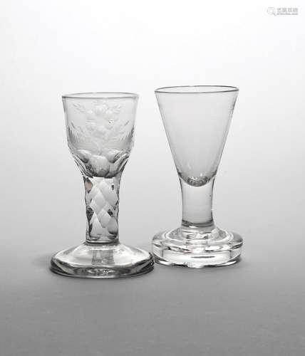 Two firing glasses late 18th century, one with a rounded funnel bowl engraved with flowers above a