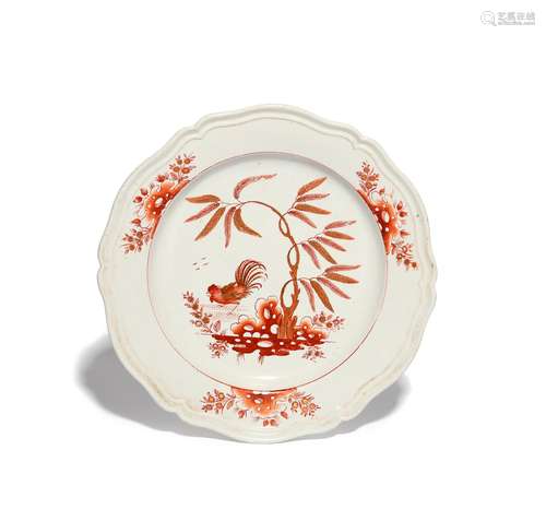 An unusual English porcelain plate late 18th/early 19th century, painted in red and gilt with a