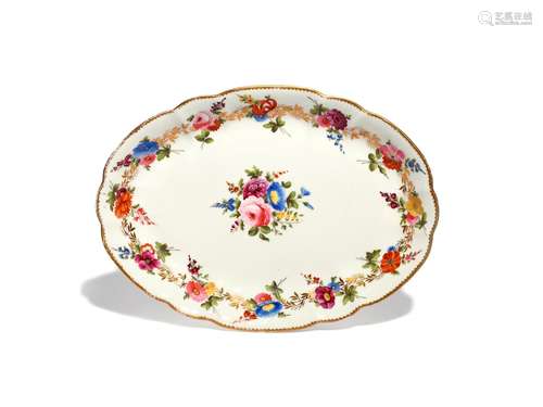 A Nantgarw oval dessert dish c.1818-20, London-decorated with a large central flower spray within