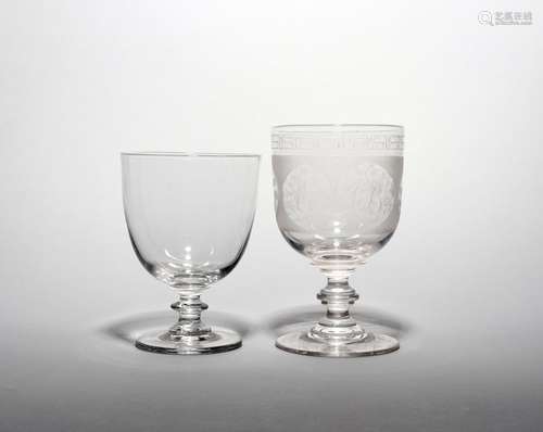 Two large glass rummers 19th century, one left plain and raised on a short knopped stem, the other