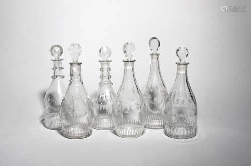 Six decanters and stoppers late 18th/19th century, of Prussian and mallet form, variously engraved