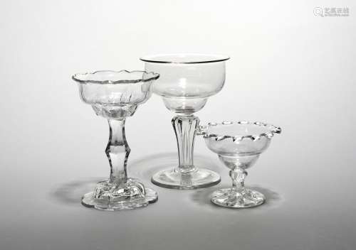 Three sweetmeat glasses c.1770 and later, the smallest with an ogee bowl with pinched rim above a