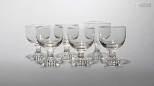 Six glass rummers 19th century, with generous rounded bowls raised on short stems and square lemon