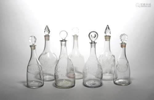 Seven decanters and stoppers late 18th/19th century, most of mallet form, variously engraved with