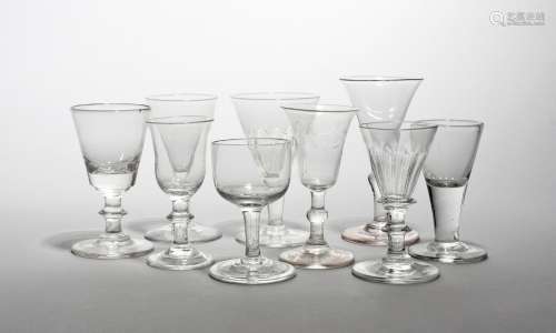 Nine small glasses 18th/19th century, with drawn trumpet, bucket and bell bowls raised on plain,