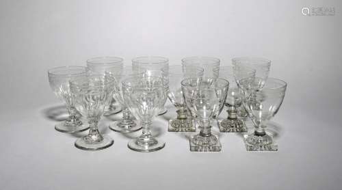 Two sets of six glass rummers early 19th century, with rounded funnel bowls, engraved with