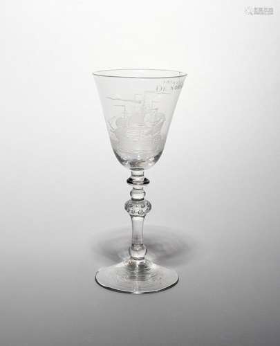 A Dutch-engraved light baluster goblet c.1765, the generous rounded funnel bowl engraved with two