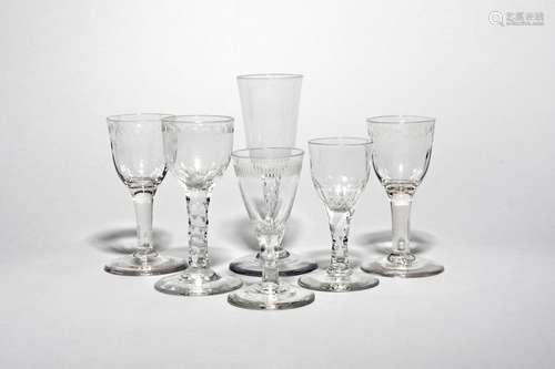 Six wine glasses c.1760-70, a pair with light moulding beneath a polished garland border, another