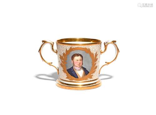 A Spode commemorative two-handled mug dated 1857, painted with a head and shoulders portrait of