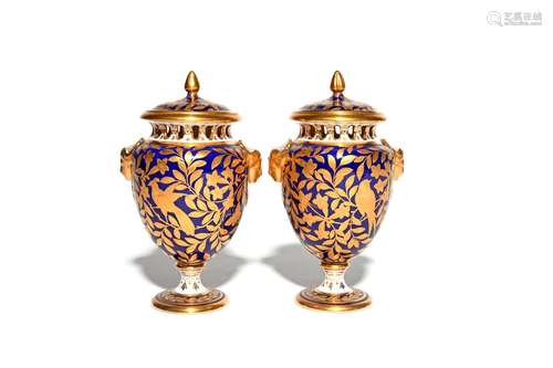 A pair of Spode Copeland's China pot pourri vases and covers early 20th century, decorated in raised