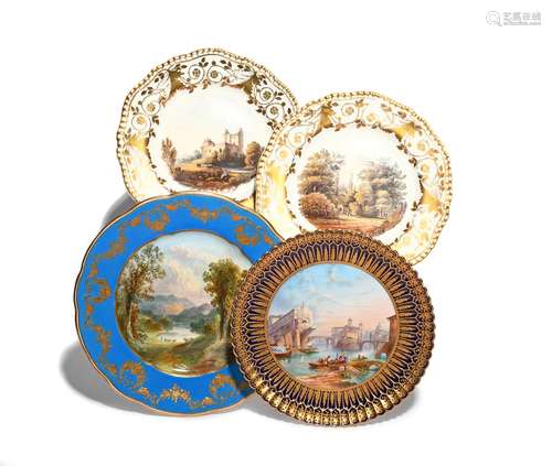 A pair of Spode plates c.1830, each painted with a landscape within a gilt scroll border, titled '