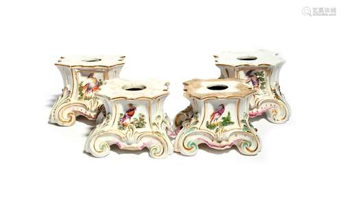 Two pairs of Derby figure stands c.1760-65, the shaped square forms painted with panels of fancy