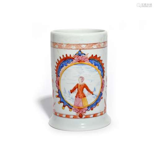 A German milchglas tankard c.1760-80, the straight-sided form painted in polychrome enamels with the