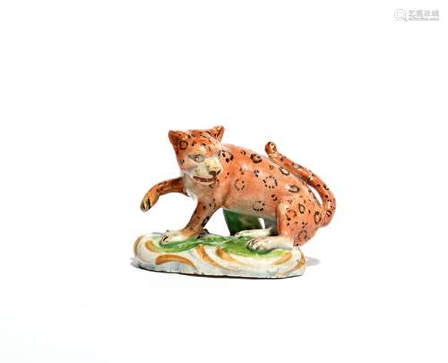 A small Staffordshire pearlware figure of a leopard c.1800, modelled in an active pose with right