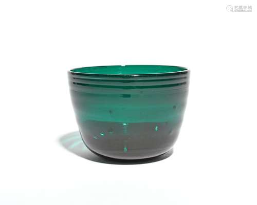 A green glass fingerbowl of Lynn type c.1780, the flared form lightly moulded with horizontal