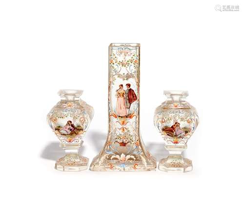 A Continental glass dressing table garniture 19th century, comprising two bottles and a central