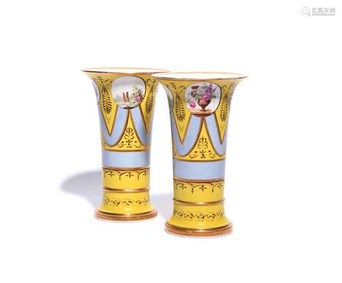 A pair of Paris porcelain vases 19th century, of flared form, painted with circular panels of