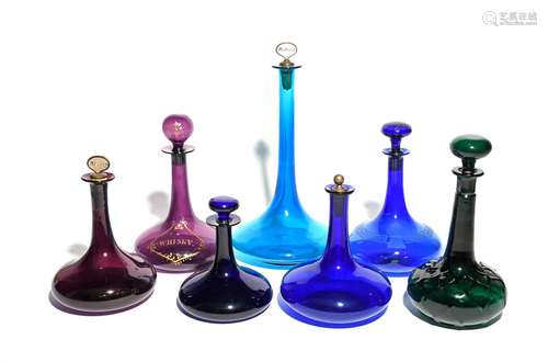 Seven coloured glass ship's decanters and stoppers 19th century, three Bristol blue with one