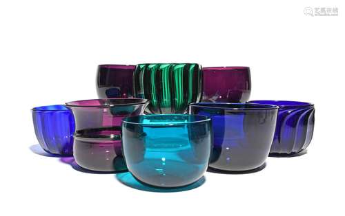 Eight coloured glass finger bowls 1st half 19th century, four of plain U-shaped form in blue,