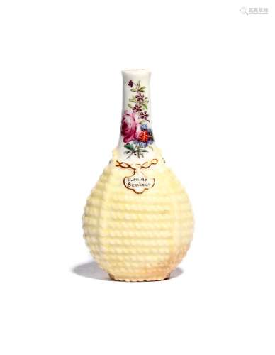 A Chelsea scent bottle c.1755, modelled as a bottle contained in a yellow wicker basket, the neck