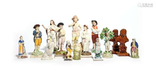 A large group of Staffordshire figures 19th century, including two treacle-glazed busts of a