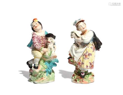 A rare pair of Derby figures of a boy and girl with a Macaroni dog and cat c.1775, the boy half