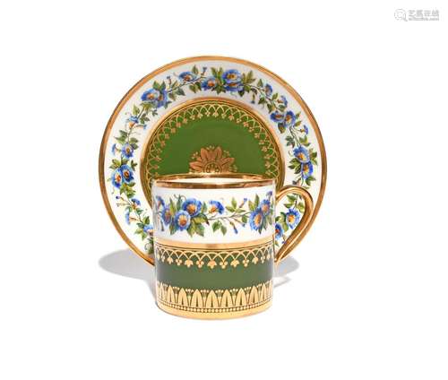 A Sèvres coffee can and saucer dated 1814, painted with a continuous band of flowering convolvulus