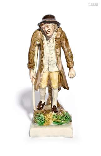 A Ralph Wood figure of Old Age late 18th/early 19th century, modelled as an old man resting on a