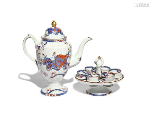 A Spode Stone China coffee pot and cover and an egg cruet 19th century, decorated in the Imari