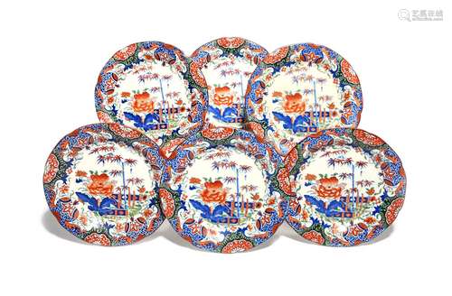 Six pearlware plates 19th century, printed in underglaze blue then hand-coloured in the Imari