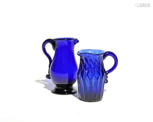 Two Bristol blue glass cream jugs c.1780-1800, one moulded with a lattice design, the other of