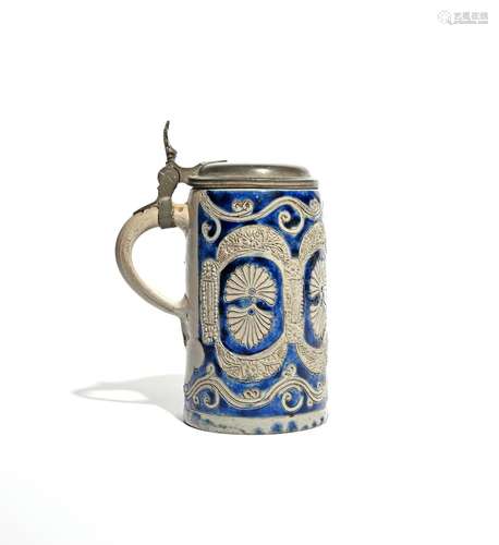 A Westerwald stoneware tankard 18th century, the cylindrical form applied and incised with a