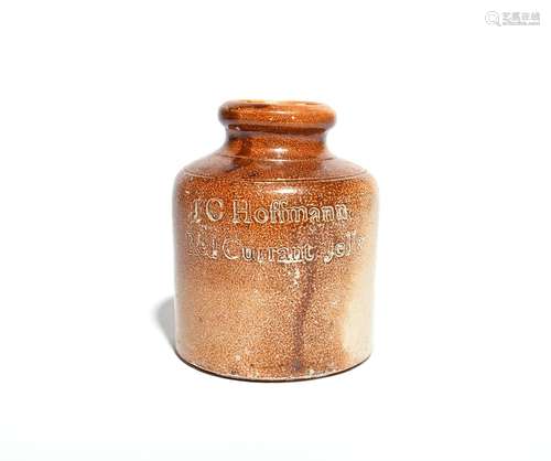 A brown stoneware preserve jar 19th century, the cylindrical form with a mottled salt glaze,