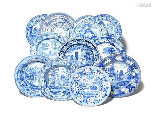 Eleven blue and white transferware plates 1st half 19th century, one John Rogers & Son with a view