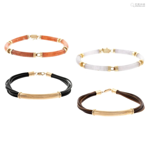 A Collection of Bracelets in 14K, Jade & Leather