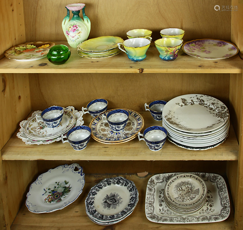 Three shelves of ironstone china