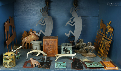 One shelf of associated decoratives including patinated