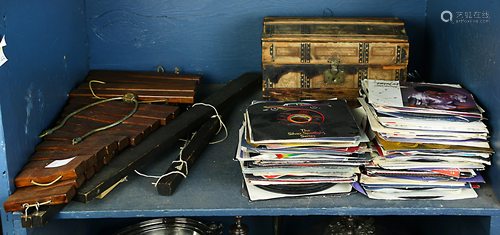 One shelf of associated decoratives including 45rpm